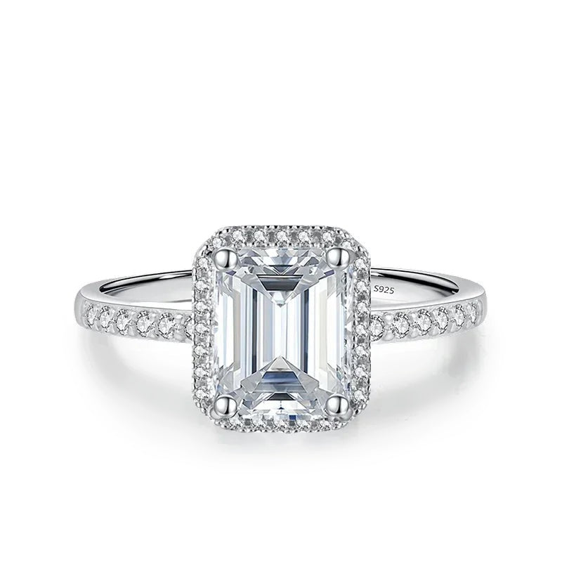 Anel de moissanite lapidação esmeralda com halo em prata 925