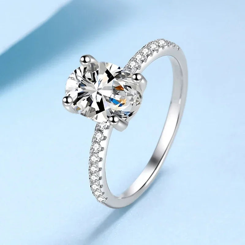 Anel de noivado oval de moissanite com aro cravejado em prata 925