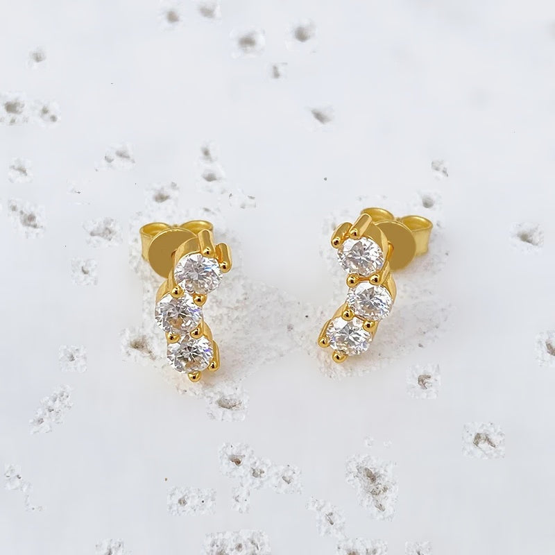 Brinco trio de moissanites curvo dourado em prata 925